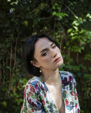 Photo Of Woman Wearing Floral Top