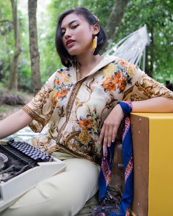 Photo Of Woman Wearing Floral Top
