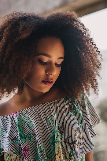 Photo of Woman Wearing Floral Top