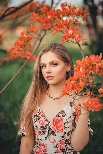 Photo Of Woman Wearing Floral Top