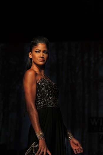 Photo of Woman Wearing Formal Dress