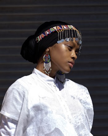 Photo Of Woman Wearing Fringe Turban