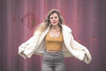 Photo of Woman Wearing Fur Coat
