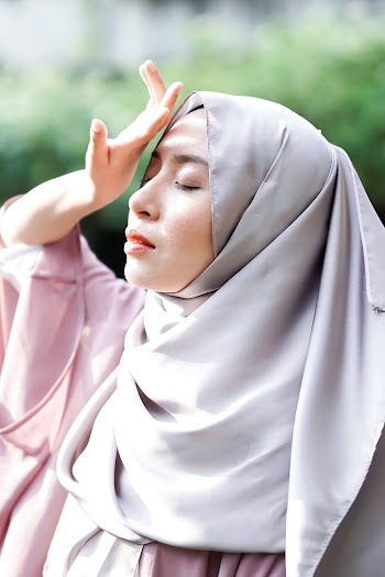 Photo of Woman Wearing Gray Hijab