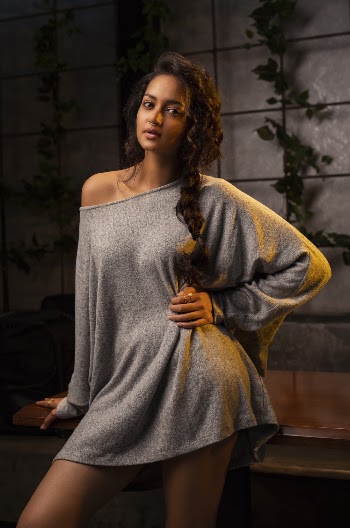 Photo of Woman Wearing Gray Off-shoulder Dress