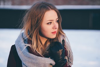 Photo of Woman Wearing Gray Scarf