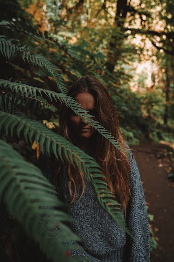 Photo Of Woman Wearing Gray Sweater