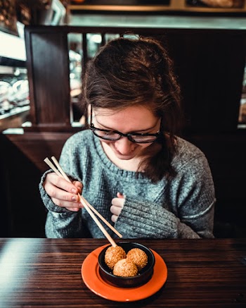 Photo of Woman Wearing Gray Sweater