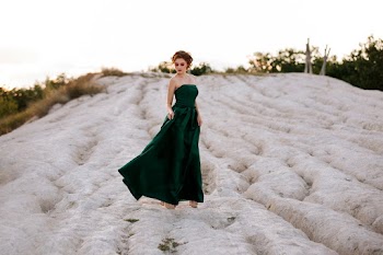 Photo of Woman Wearing Green Dress