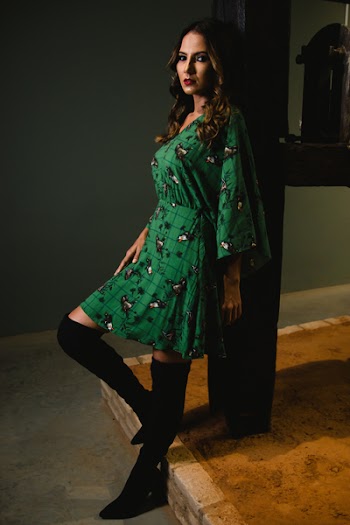 Photo of Woman Wearing Green Dress