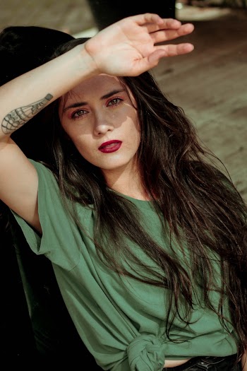 Photo of Woman Wearing Green Shirt