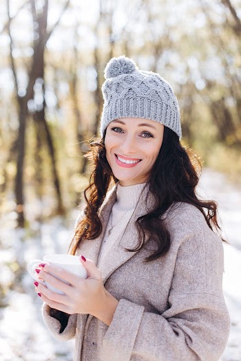 Photo of Woman Wearing Grey Beanie