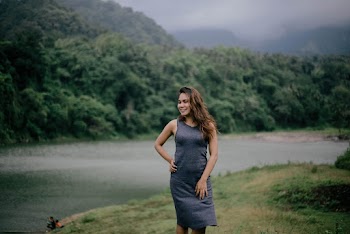 Photo of Woman Wearing Grey Dress