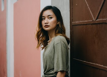 Photo of Woman Wearing Grey Shirt