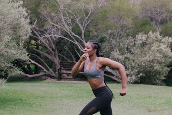 Photo Of Woman Wearing Grey Sports Bra