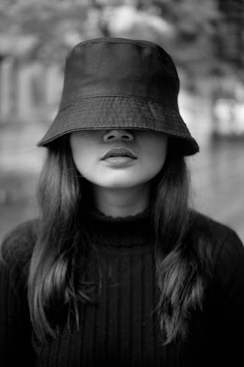 Photo Of Woman Wearing Hat