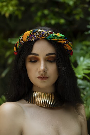 Photo Of Woman Wearing Head Scarf