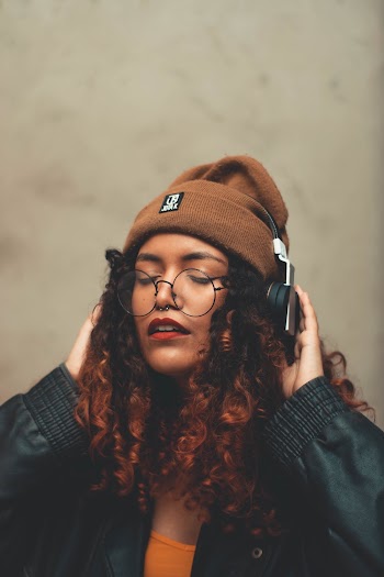 Photo Of Woman Wearing Headphones