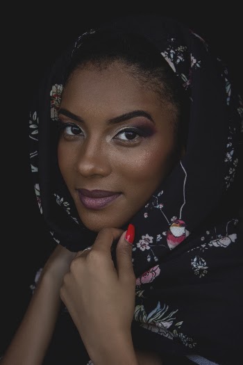 Photo Of Woman Wearing Headscraf