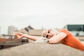 Photo of Woman Wearing Heart-Shaped Sunglasses