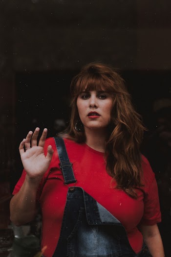 Photo of Woman Wearing Jumper