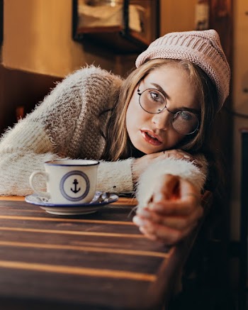 Photo Of Woman Wearing Knitted Sweater