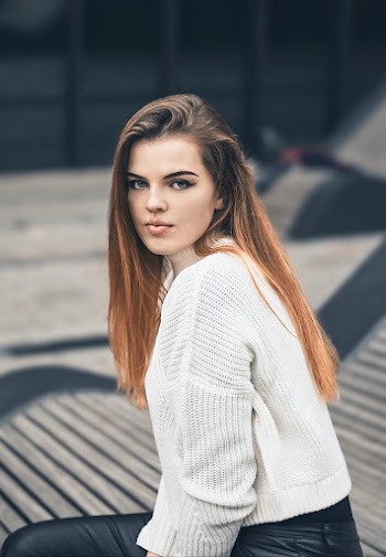 Photo Of Woman Wearing Knitted Sweater