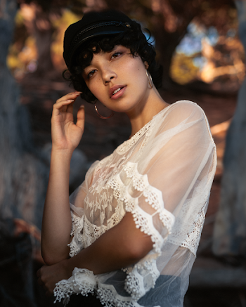 Photo Of Woman Wearing Lace Top