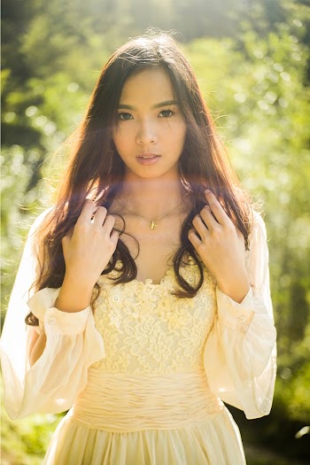 Photo Of Woman Wearing Laced Dress