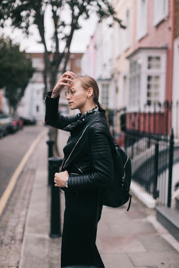 Photo of Woman Wearing Leather Jacket