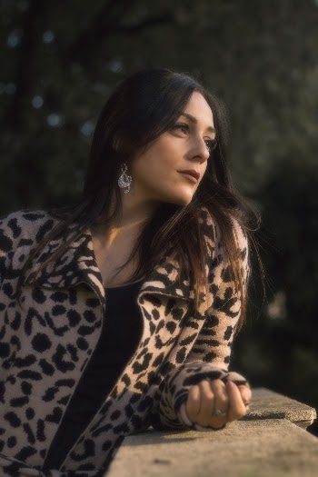 Photo of Woman Wearing Leopard Print Jacket