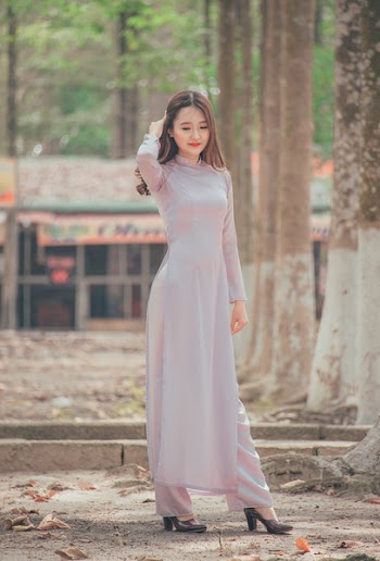 Photo of Woman Wearing Long Dress