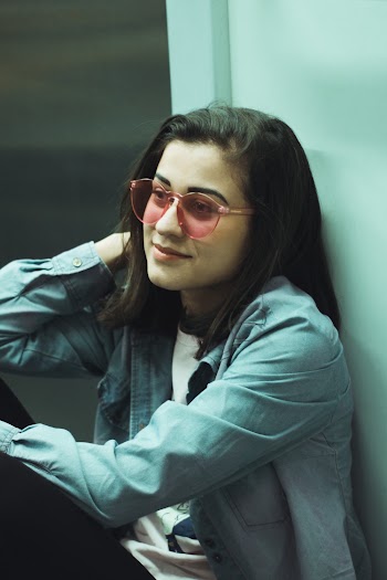 Photo of Woman Wearing Long-sleeved Shirt and Eyeglasses 