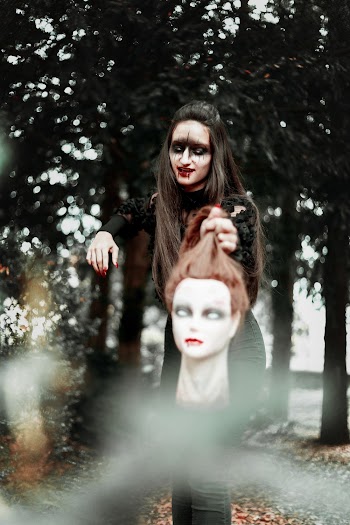 Photo Of Woman Wearing Mannequin Head