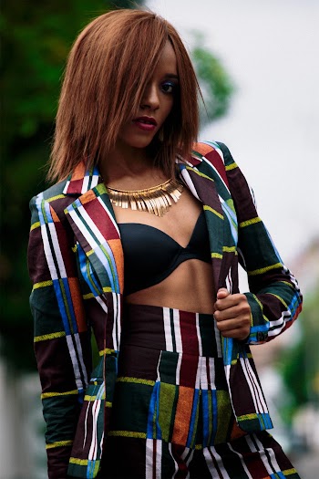 Photo of Woman Wearing Multicolored Blazer