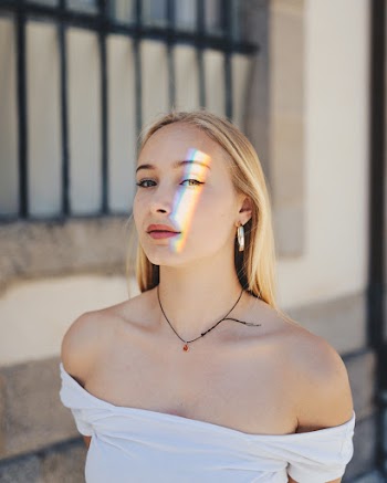 Photo of Woman Wearing Off-shoulder Top