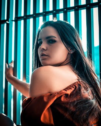 Photo of Woman Wearing Off Shoulder Top