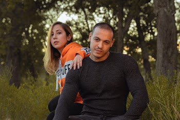 Photo Of Woman Wearing Orange Hoodie
