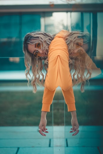 Photo Of Woman Wearing Orange Jacket