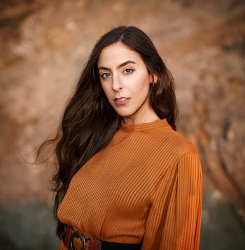 Photo Of Woman Wearing Orange Long Sleeves