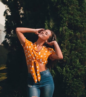 Photo of Woman Wearing Orange Top