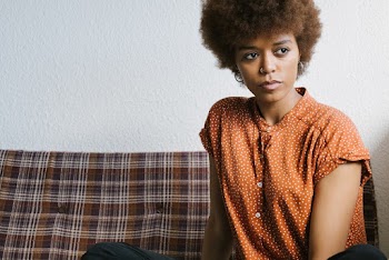 Photo Of Woman Wearing Orange Top