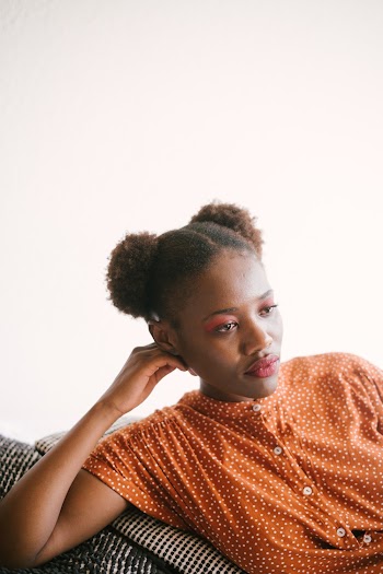 Photo Of Woman Wearing Orange Top