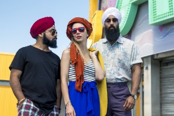 Photo of Woman Wearing Orange Turban