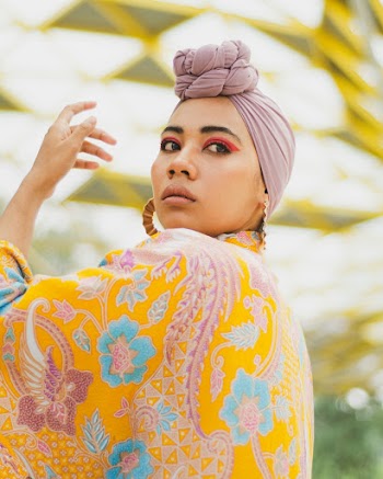 Photo Of Woman Wearing Paisley Print Dress