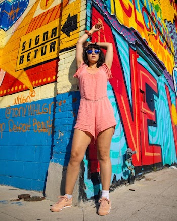 Photo Of Woman Wearing Pink Jumpsuit