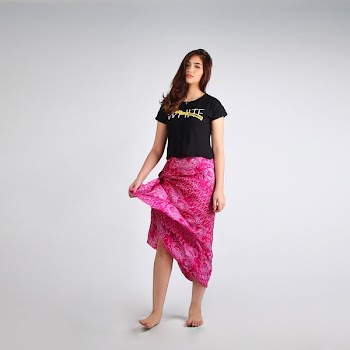 Photo of Woman Wearing Pink Sarong