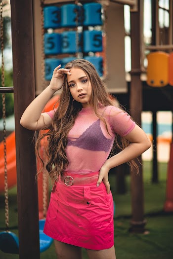 Photo Of Woman Wearing Pink See-Through Top