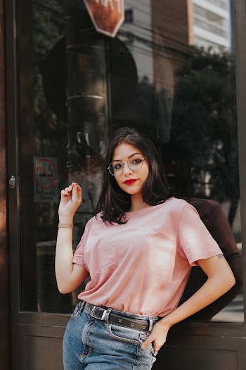 Photo of Woman Wearing Pink Shirt