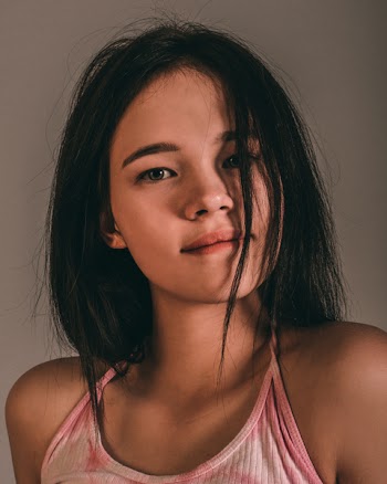 Photo of Woman Wearing Pink Top